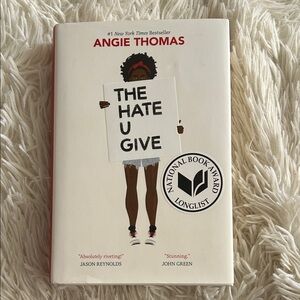 The Hate U Give by Angie Thomas, hardcover, like new - Red and White